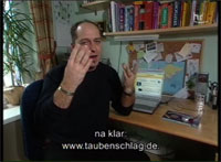Standbild aus der Sendung. Untertitel: "na klar, www.taubenschlag.de